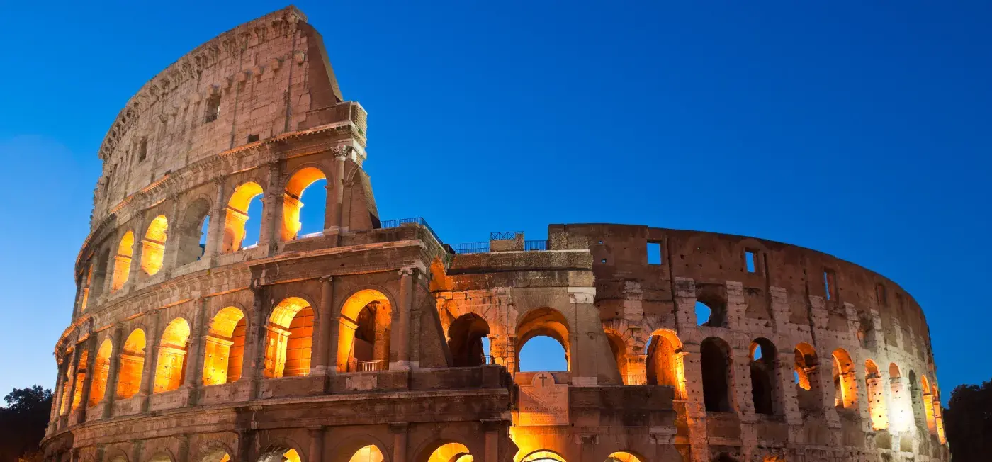 lit up at night Colosseum View of Milan, Italy